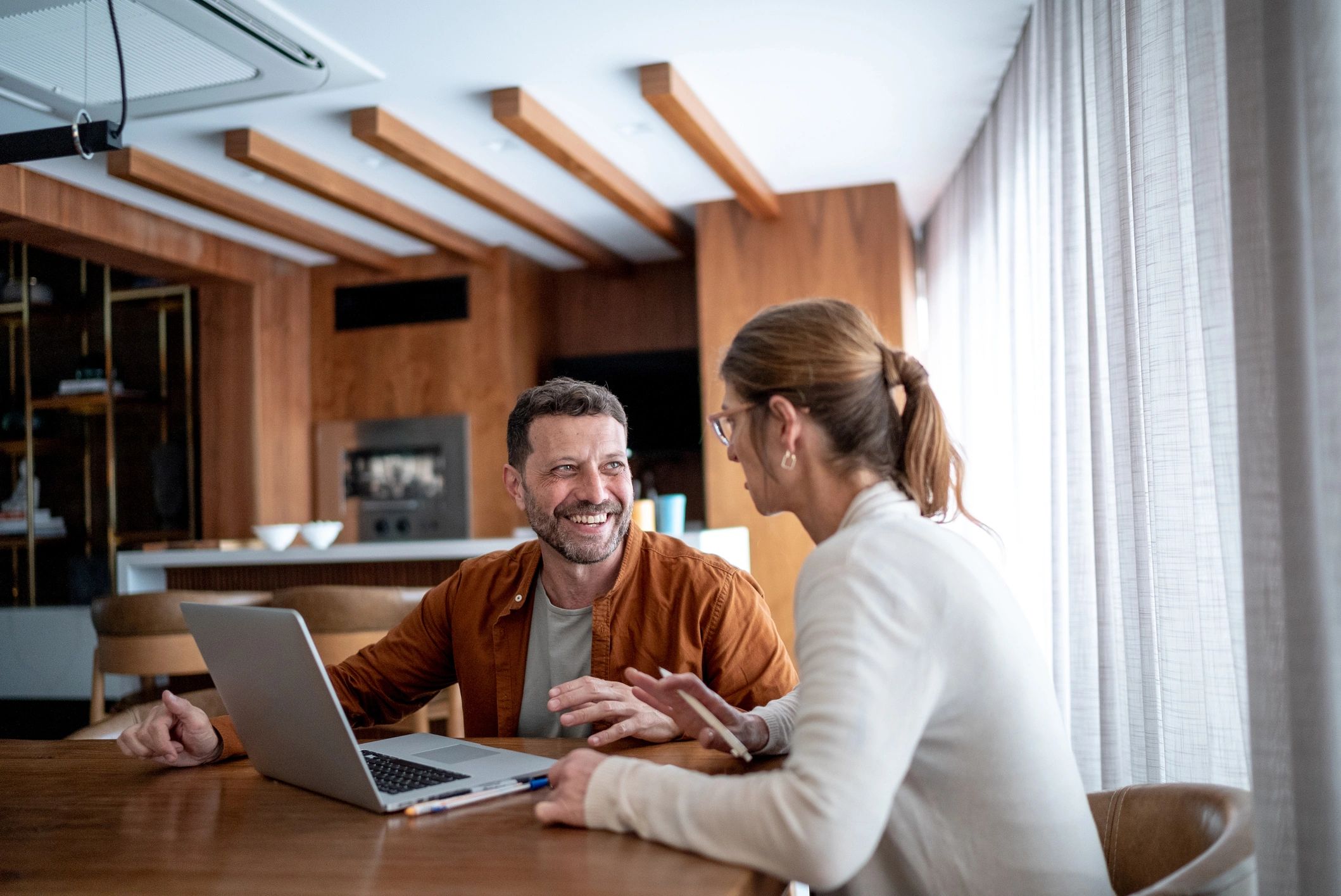 Couple reviewing home financing options together