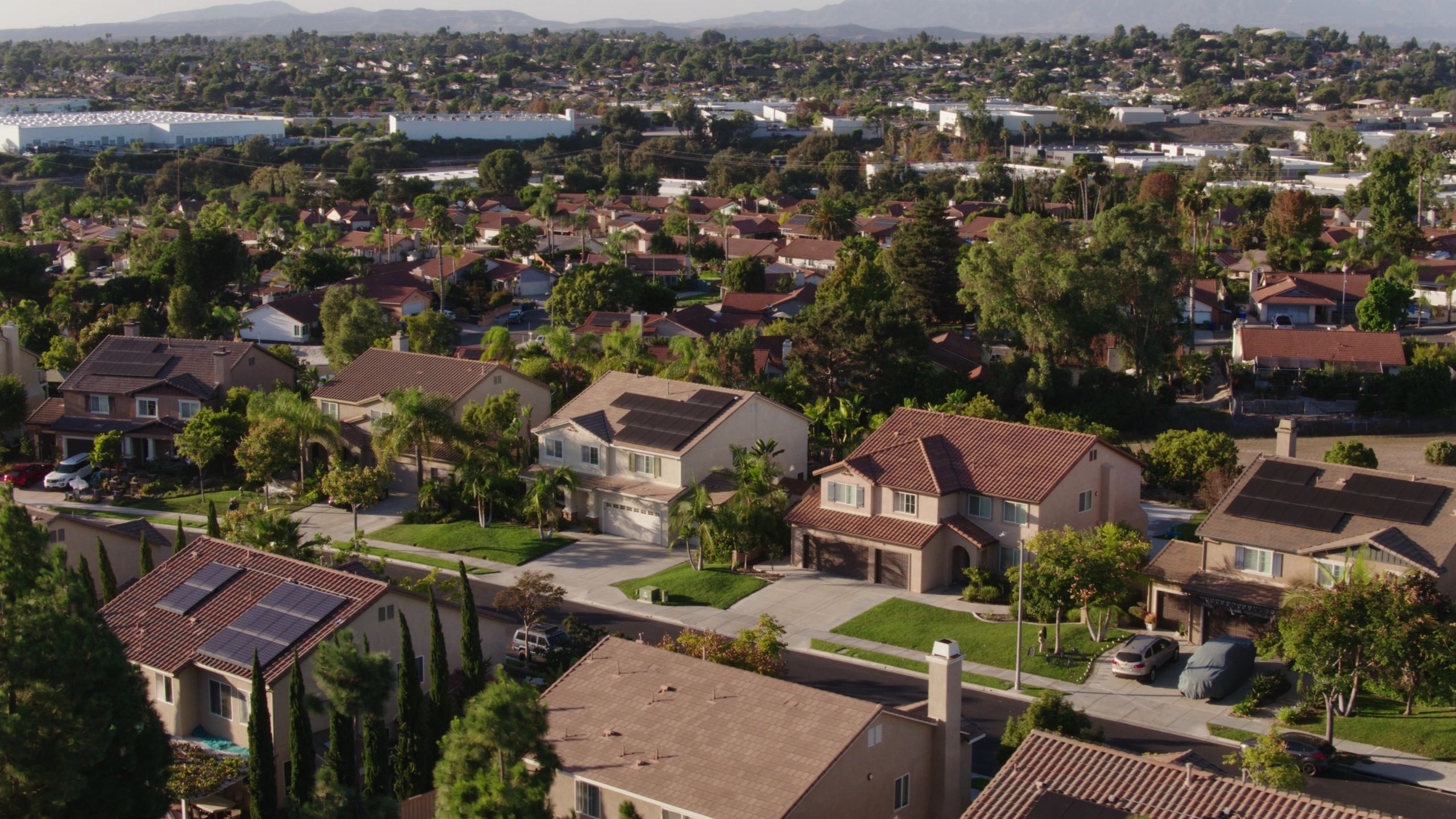 California suburban neighborhood with homes and hills