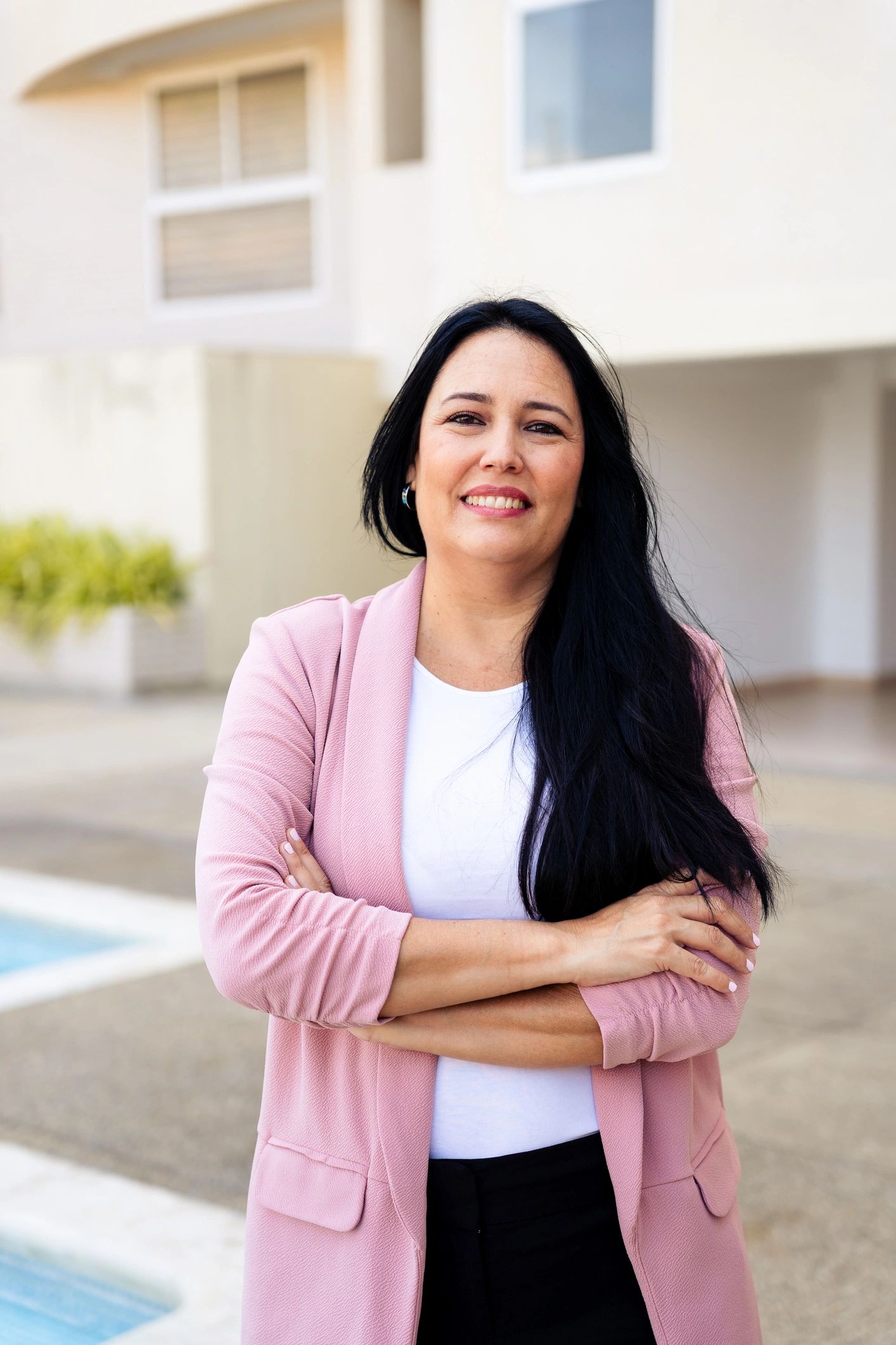 Professional real estate and lending professional outside a modern building